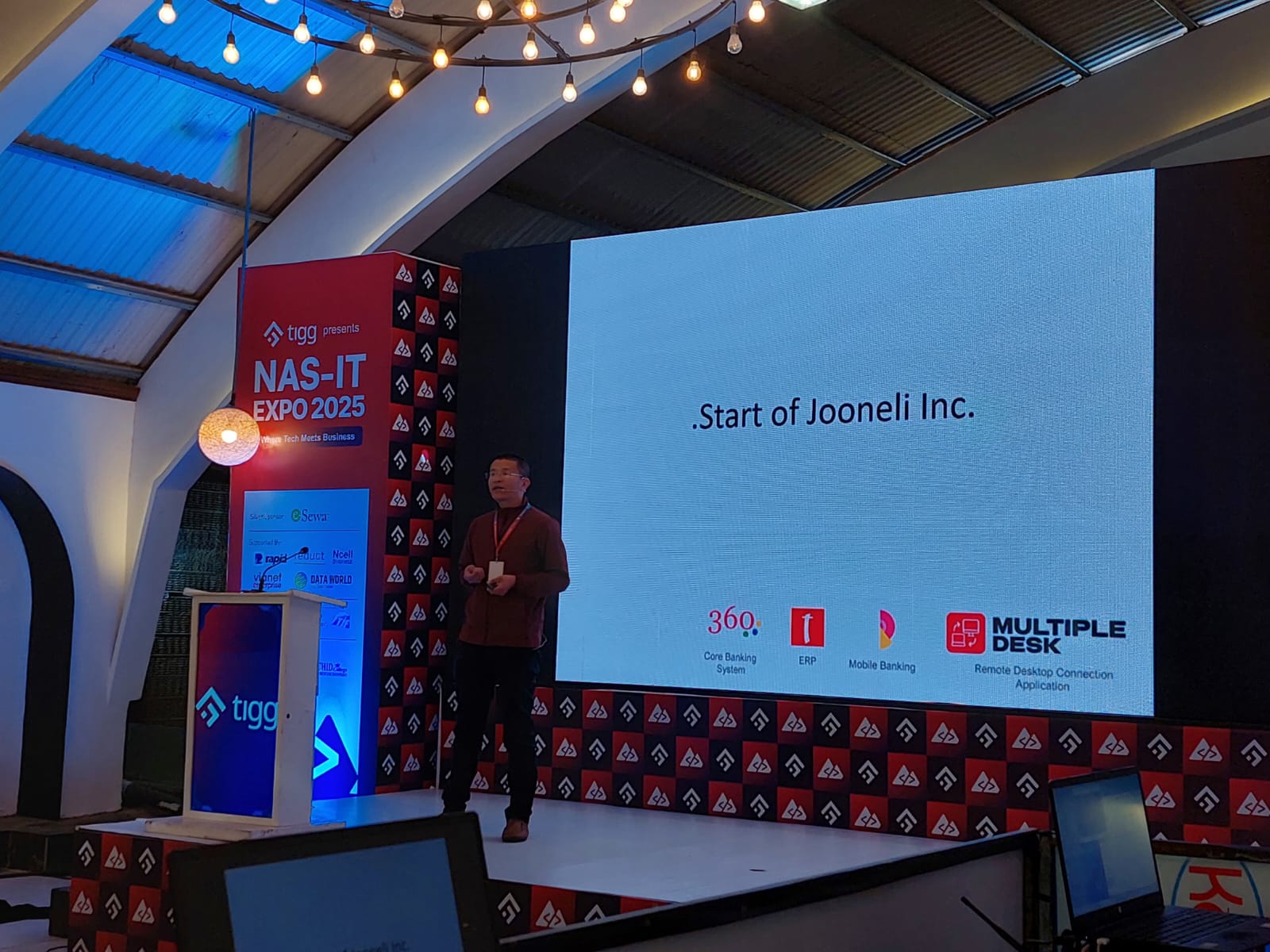 Presenting the launch of Jooneli Inc. and Multiple Desk on stage at NAS-IT Expo 2025